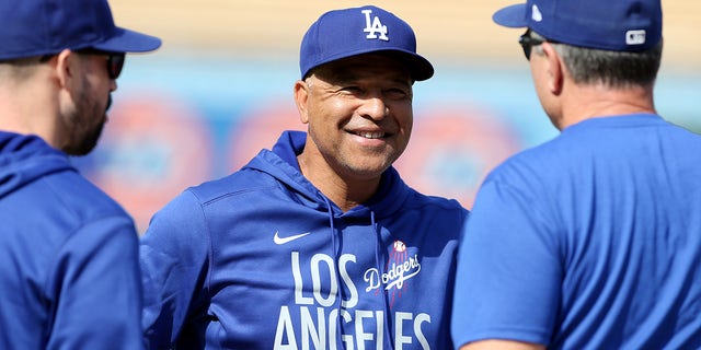 Manager Dave Roberts of the 30th Los Angeles Dodgers looks on before the game between the St. Louis Cardinals and the Los Angeles Dodgers at Dodgers Stadium on Wednesday, October 6, 2021 in Los Angeles, California.