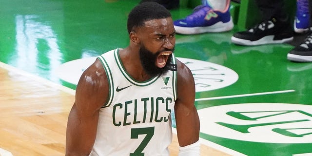 , Boston Celtics guard Jaylen Brown reacts after a three-point basket against the San Antonio Spurs in the third quarter, April 30, 2021, at TD Garden in Boston, Massachusetts.
