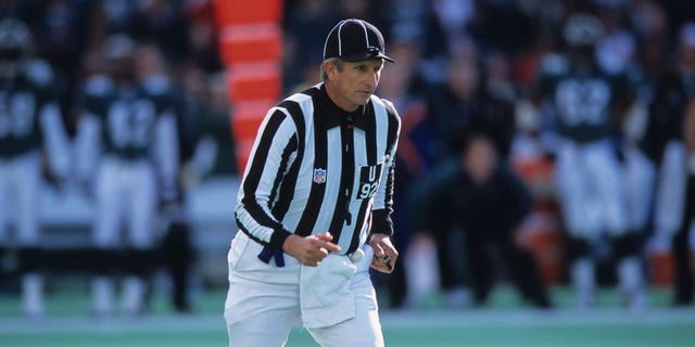 Referee Karl Madsen, National Football League referee, watches the play during a game between the Washington Redskins and the Philadelphia Eagles at Veterans Stadium on October 8, 2000 in Philadelphia, Pennsylvania.  (Photo by George Goikovic/Getty Images)