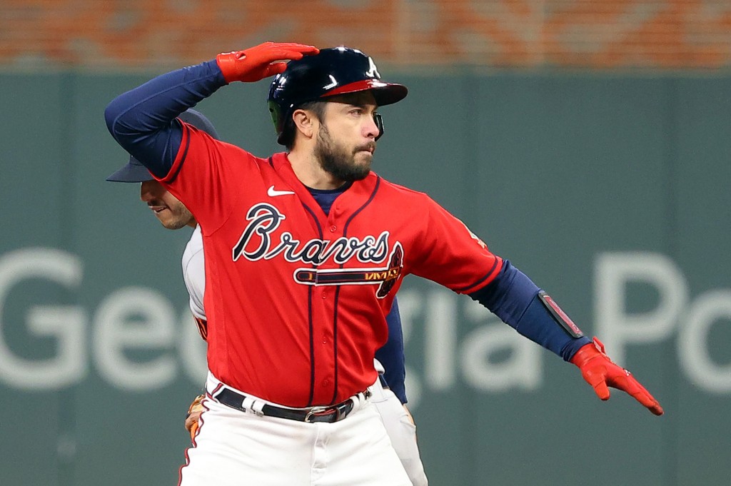 Travis Darno, who also presented, celebrated the double in the Braves' Game 3 win over the Astros on Friday.