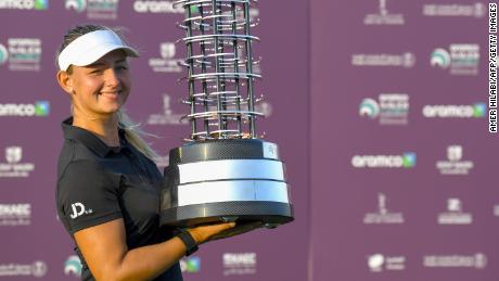 Pedersen celebrates the trophy after winning the 2020 Saudi Women's International Championship.