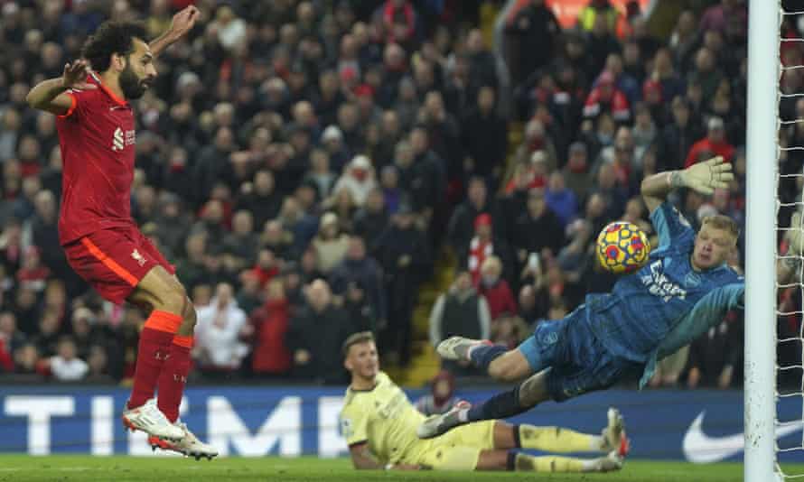 Mohamed Salah scores the third goal for his team after a cross from Sadio Mane