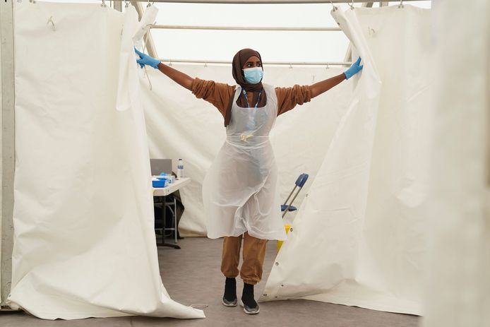 A health worker at a makeshift vaccine site in Langdon Park, London.