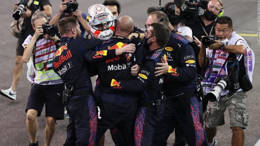 Max Verstappen wins his first Formula One world title after a dramatic end to the Abu Dhabi Grand Prix