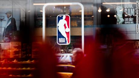 The National Basketball Association warns non-vaccinated players about updated travel restrictions for games in Canada