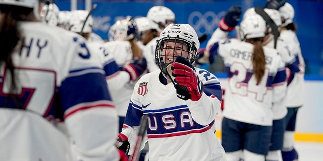 The United States' Kendall Coyne Schofield celebrates after a win against Finland in a preliminary round women's hockey game at the 2022 Winter Olympics, Thursday, Feb.  3, 2022, in Beijing.