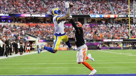 Los Angeles Rams wide receiver Odell Beckham Jr. catches the ball to land in front of Cincinnati Bengals cornerback Mike Hilton during Super Bowl LVI. 
