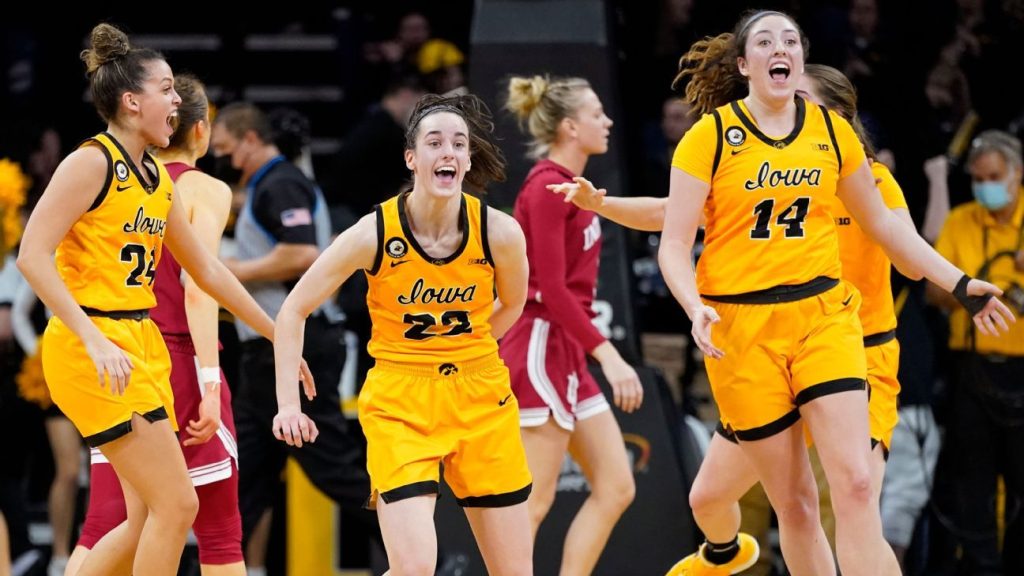 The Iowa Hawkeyes jump to 12th in the women's AP top 25 with the top five remaining unchanged