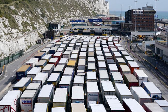 Truck drivers stand in line at the Dover Gate.  They are stuck due to a faltering IT system and problems at the ferry service provider P&O Ferries.