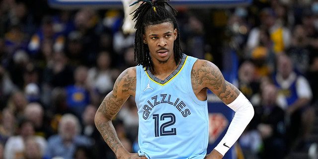 Ja Morant of the Memphis Grizzlies #12 looks against the Golden State Warriors in the second half of Game Three of the NBA Playoffs Semifinals at Chase Center on May 7, 2022 in San Francisco, California. 