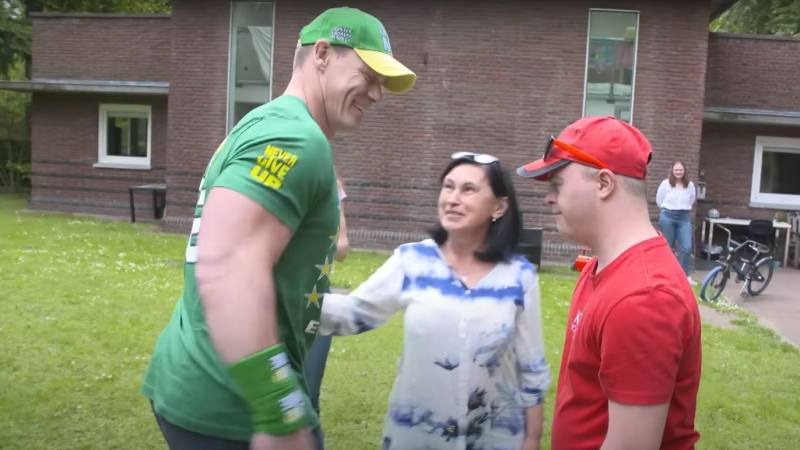 Ukrainian teenager with Down syndrome meets hero John Cena after fleeing Mariupol