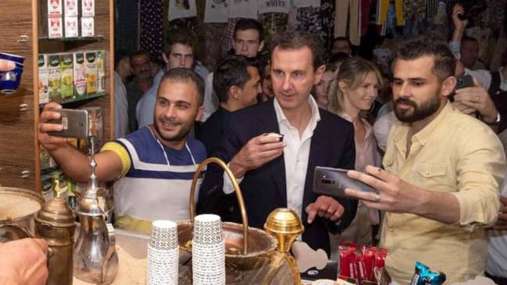 President al-Assad for the first time in recaptured Aleppo