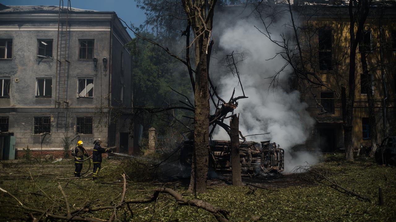 Firefighters put out a fire in Kramatorsk after a Russian missile hit it.