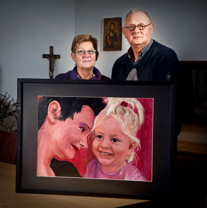 Clary and Geir van der Burgh with a painting of their murdered daughter, Maris, and granddaughter of kidnapped Isra.