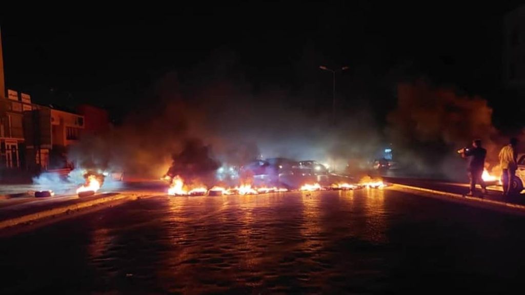 Protesters storm the Libyan parliament building and set fire to it