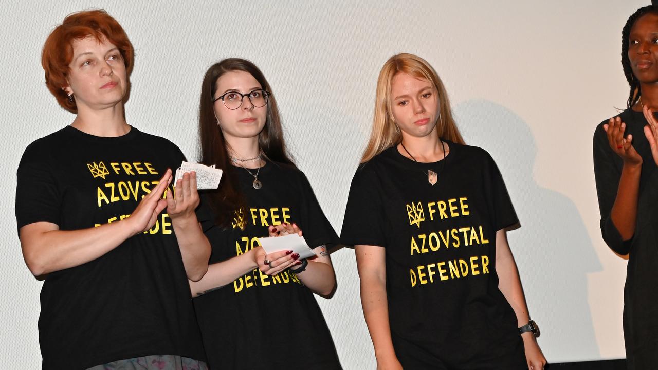 Daria Tsykanova, second from left, at the premiere of a documentary about Ukraine earlier this summer.