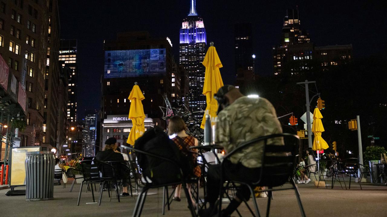 The Empire State Building in New York is covered in purple and silver in honor of the late Queen.