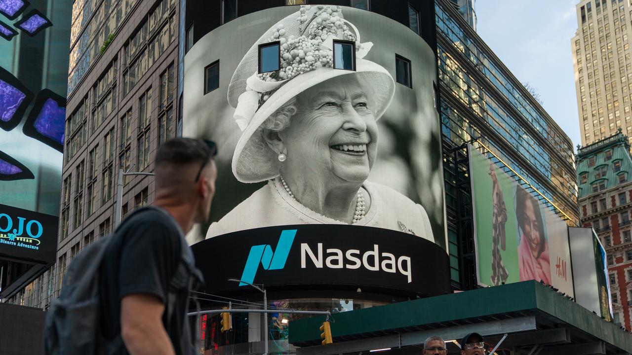 A portrait of Queen Elizabeth on a digital billboard in Times Square, New York.