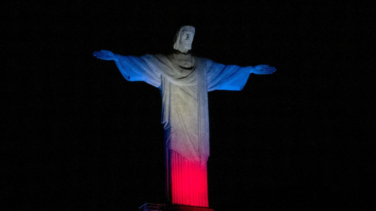 In Brazil, a statue of Jesus is dressed in the colors of the British flag.