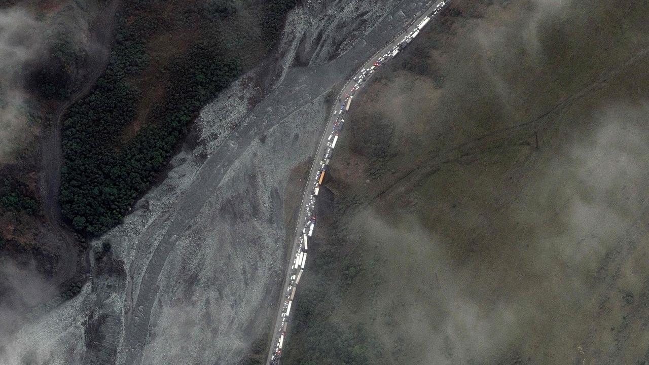 A satellite image of long lines of cars and trucks on their way to the Georgia-Russia border.