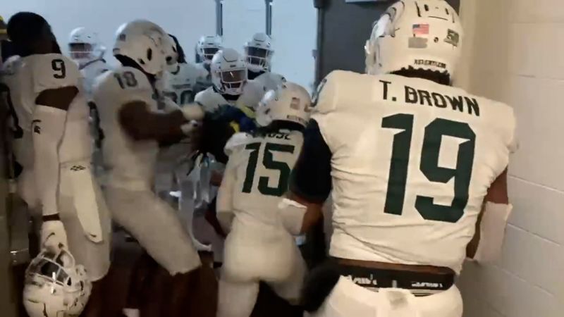 Michigan State suspends 4 players while school police investigate a brawl after defeating Wolverines Spartans