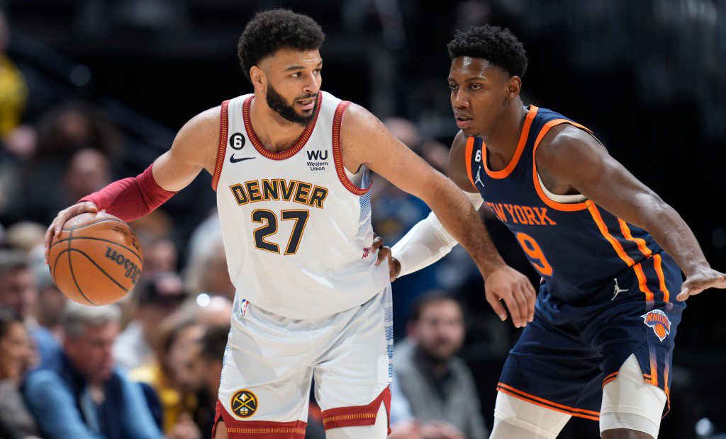 Jamal Murray, who scored 21 points, looks to make a move on RJ Barrett during the Knicks' victory over the Nuggets.