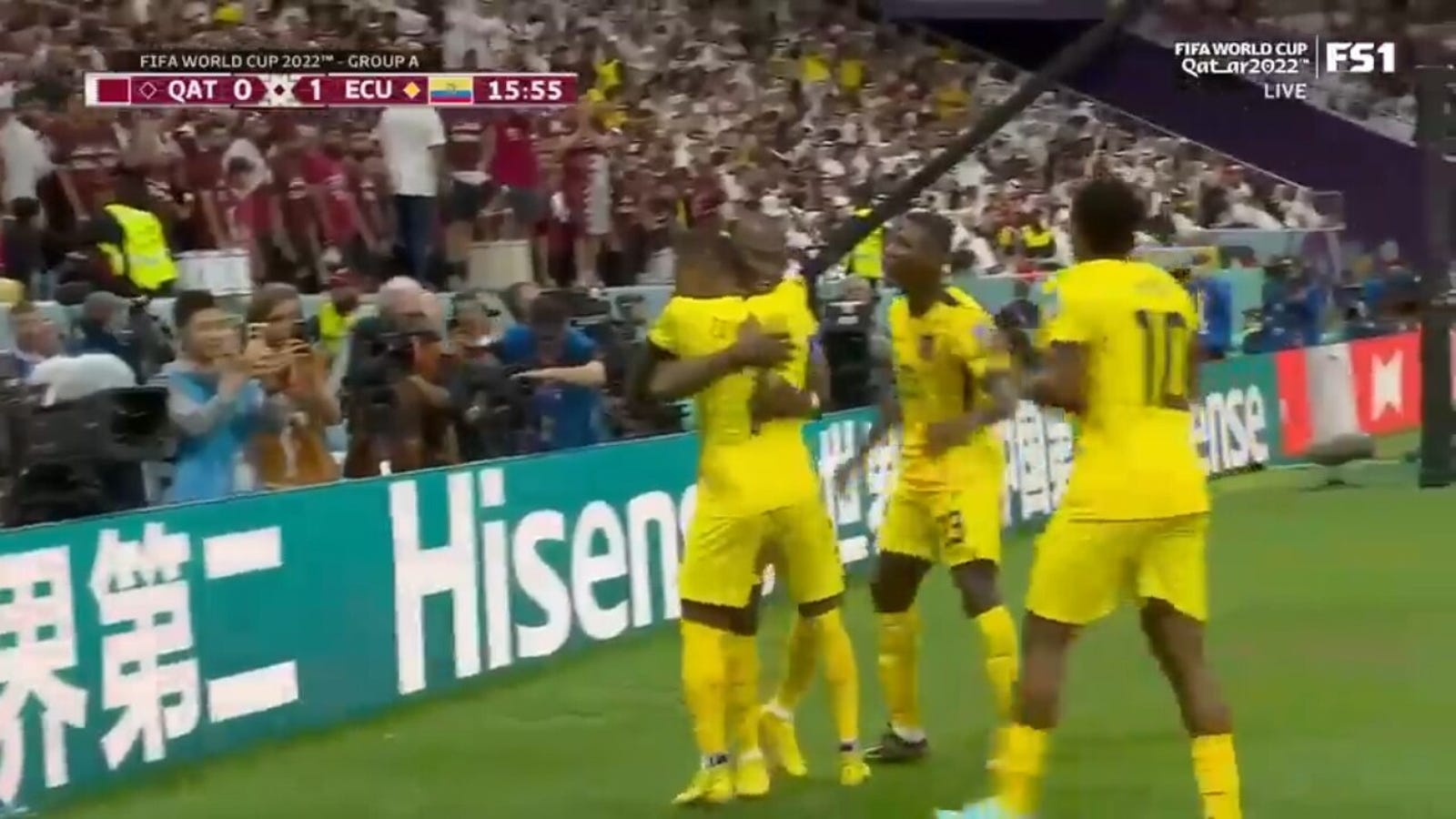 Ecuador's Ener Valencia fouls in the penalty area and scores a kill goal against Qatar 