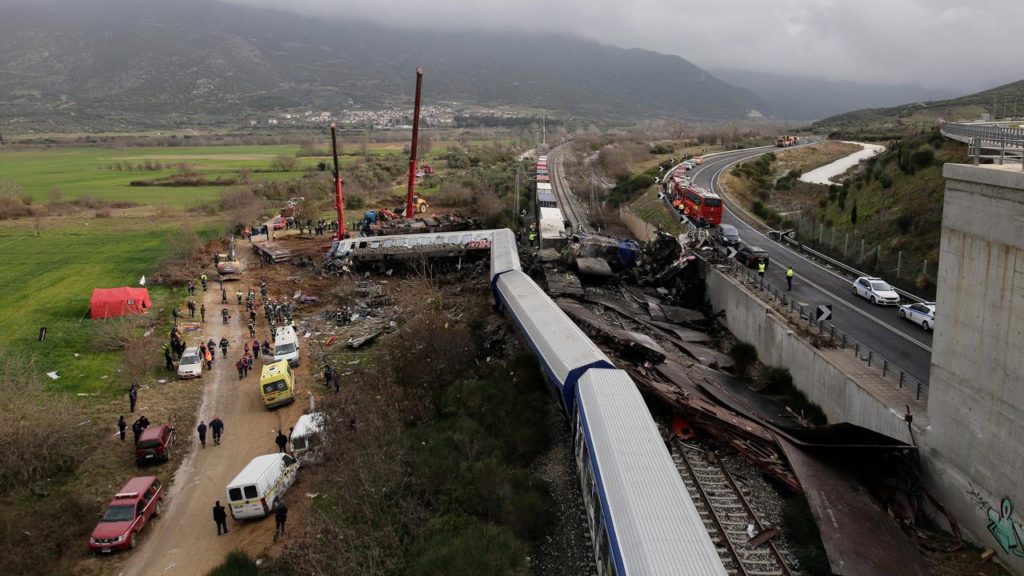 A train collision, according to the Greek Prime Minister, was the result of "tragic human error".  outside