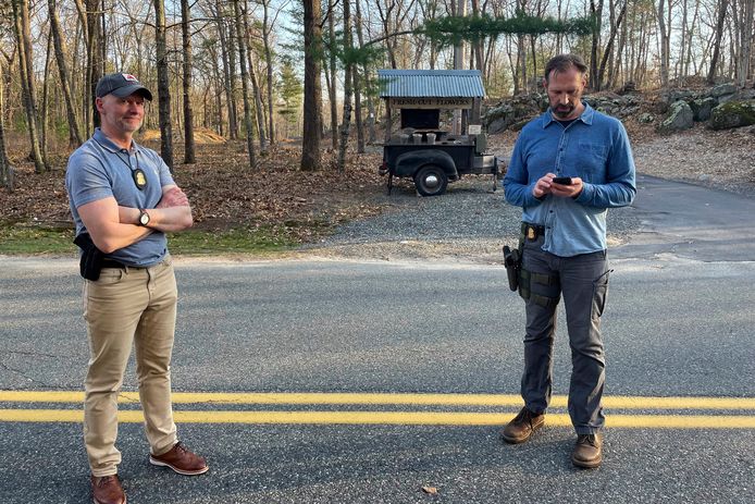 FBI agents at the door of Jack Teixeira's home.