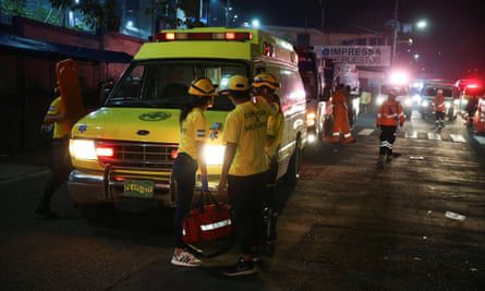 Paramedics outside the stadium in San Salvador.