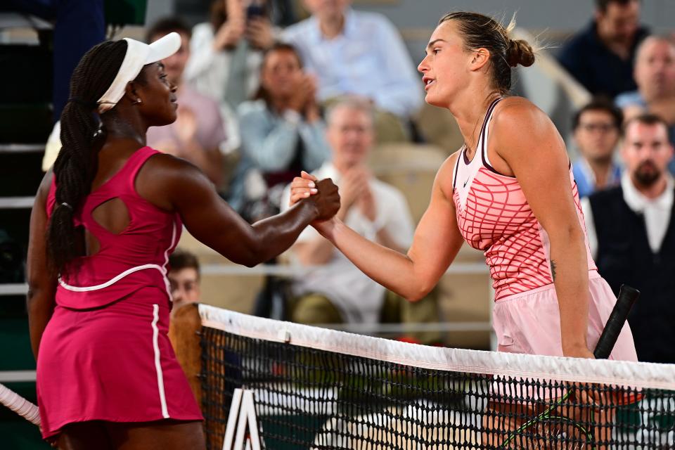 Belarus & # 39;  Aryna Sabalenka (R) shakes hands with American Sloane Stephens after winning during her women's singles match on day eight of the Roland Garros French Open tennis tournament at Court Philippe Chatrier in Paris on June 4, 2023. (Photo by Emmanuel Dunand/AFP) (Photo by Emmanuel Dunand/AFP) (AFP via Getty Images)