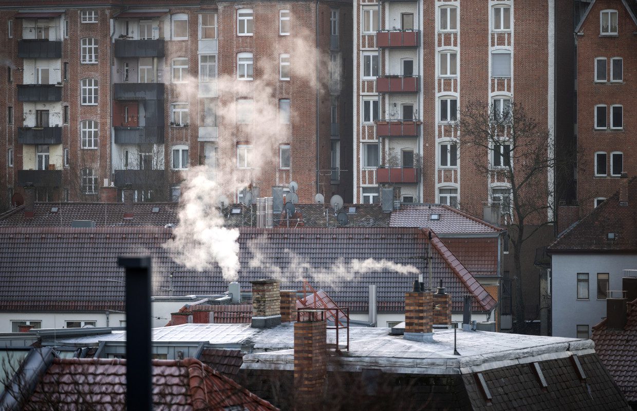 Smoking chimneys in Stuttgart.  Many German homes still use fuel oil.  Image Getty Images