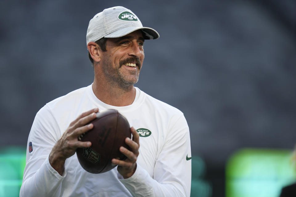 New York Jets quarterback Aaron Rodgers prepares before an NFL preseason football game against the Tampa Bay Buccaneers, Saturday, Aug. 19, 2023, in East Rutherford, N.J. (AP Photo/Seth Wenig)