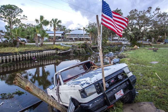 A car submerged in water due to the storm.