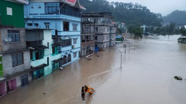 Ten dead and dozens missing in India after floods