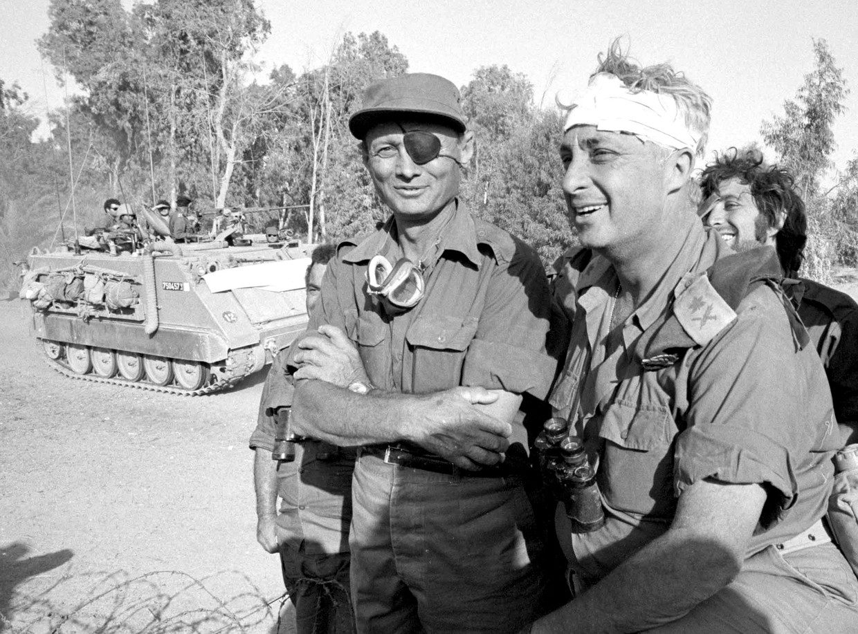 General Moshe Dayan (left) in 1973. During his reign, the commando mentality spread in the army.  On the right is Ariel Sharon, later Prime Minister.  Reuters photo