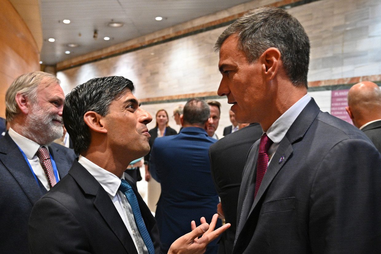 British Prime Minister Rishi Sunak (left) in conversation with outgoing Spanish Prime Minister Pedro Sanchez at the European Union summit in Granada, Spain.  AP photo