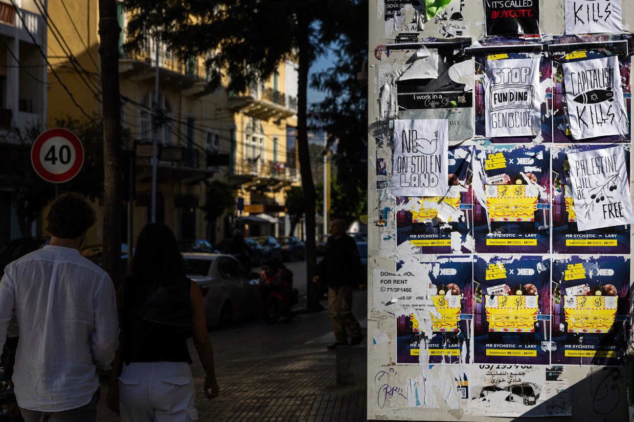 Pro-Palestinian leaflets on a wall in Beirut.  Photo by Danielle Card for Volkskrant