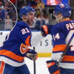 Kyle Palmieri's history-making triple led the Islanders to a huge win over the Bruins
