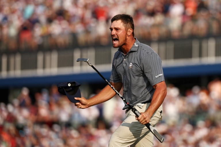 American Bryson DeChambeau reacts after sinking the winning putt at the 18th hole to capture the US Open at Pinehurst (Jared C. Tilton)