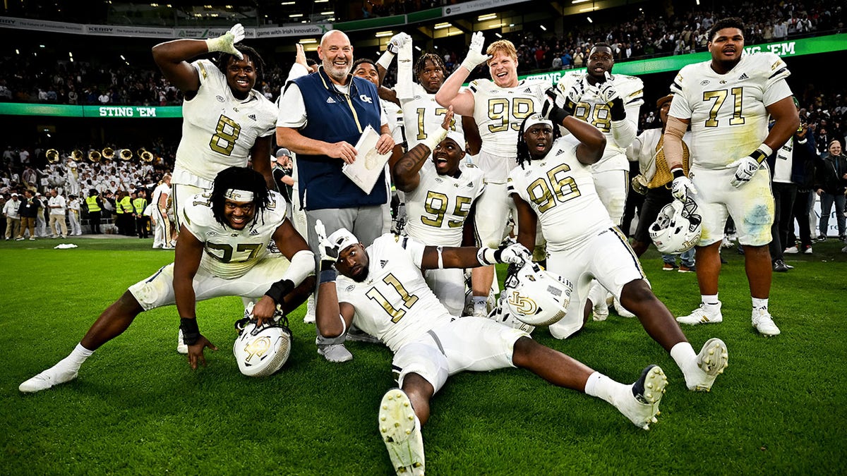 Georgia Tech players celebrate.