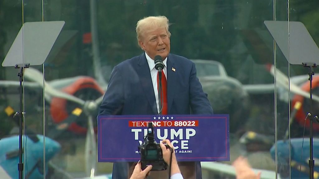 A highly secure Trump holds his first outdoor meeting since the attack.